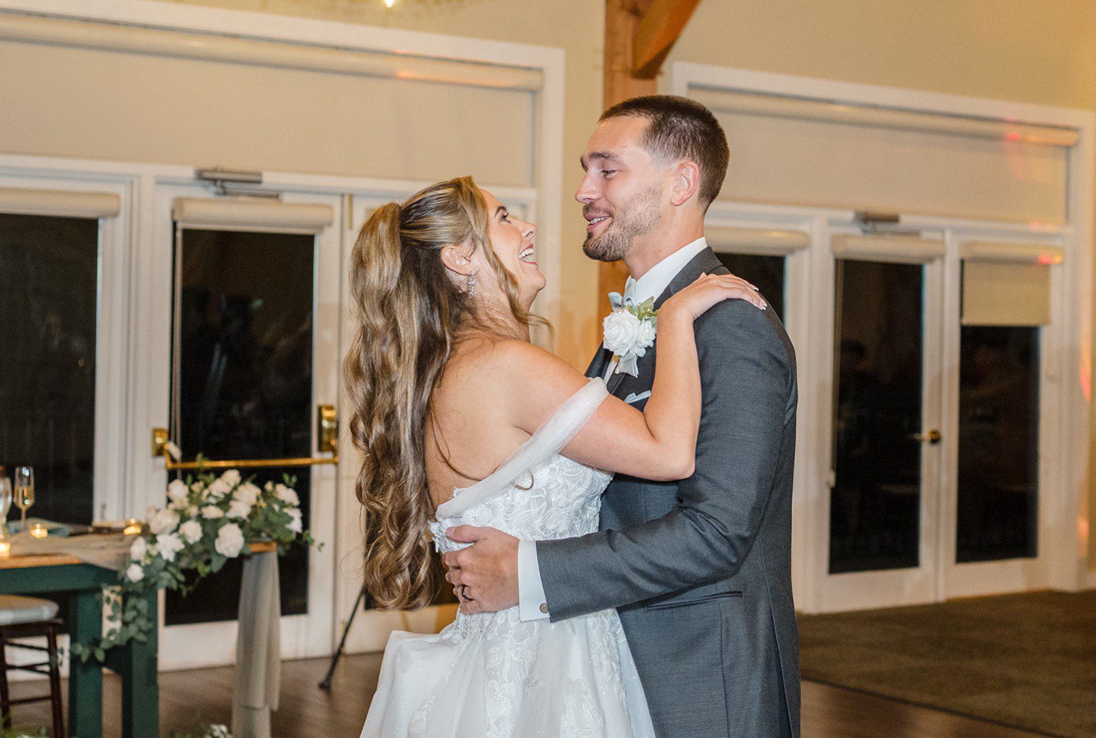 Bride and groom dancing in the barn, captured by Philadelphia wedding photographers from Original Weddings at Glasbern