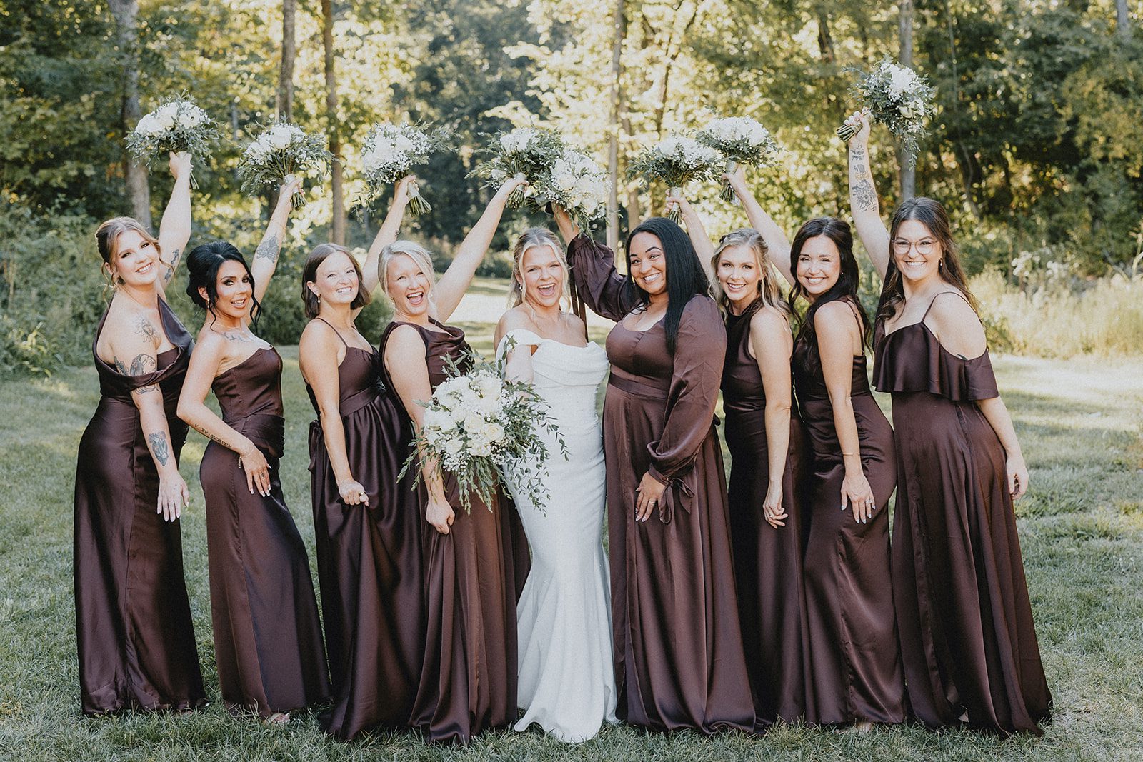 pine-hollow-farms-rustic-st-louis-natalie-john-p011-21 Bride with bridesmaids in deep plum dresses at Pine Hollow Farms
