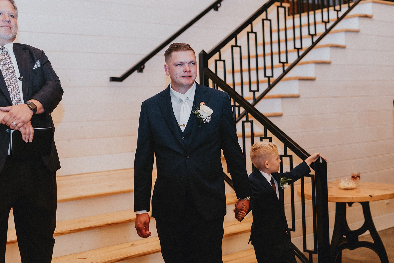pine-hollow-farms-rustic-st-louis-natalie-john-p012-09 Groom waiting by the staircase