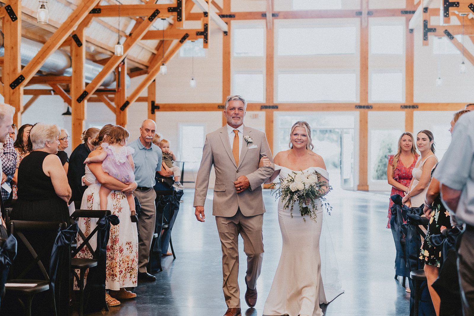 pine-hollow-farms-rustic-st-louis-natalie-john-p015-10 Indoor barn ceremony with guests