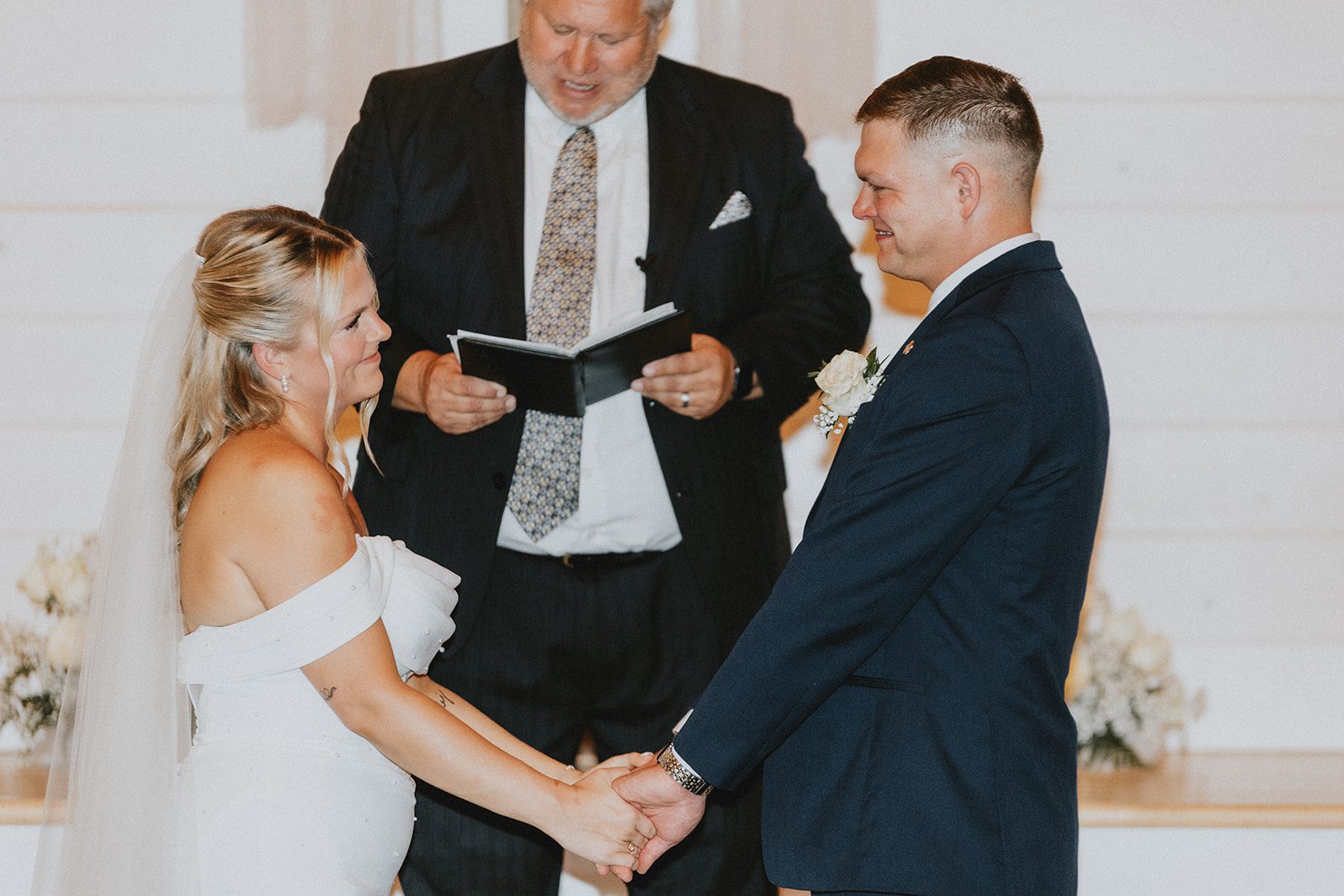 pine-hollow-farms-rustic-st-louis-natalie-john-p017-32 Couple exchanging vows