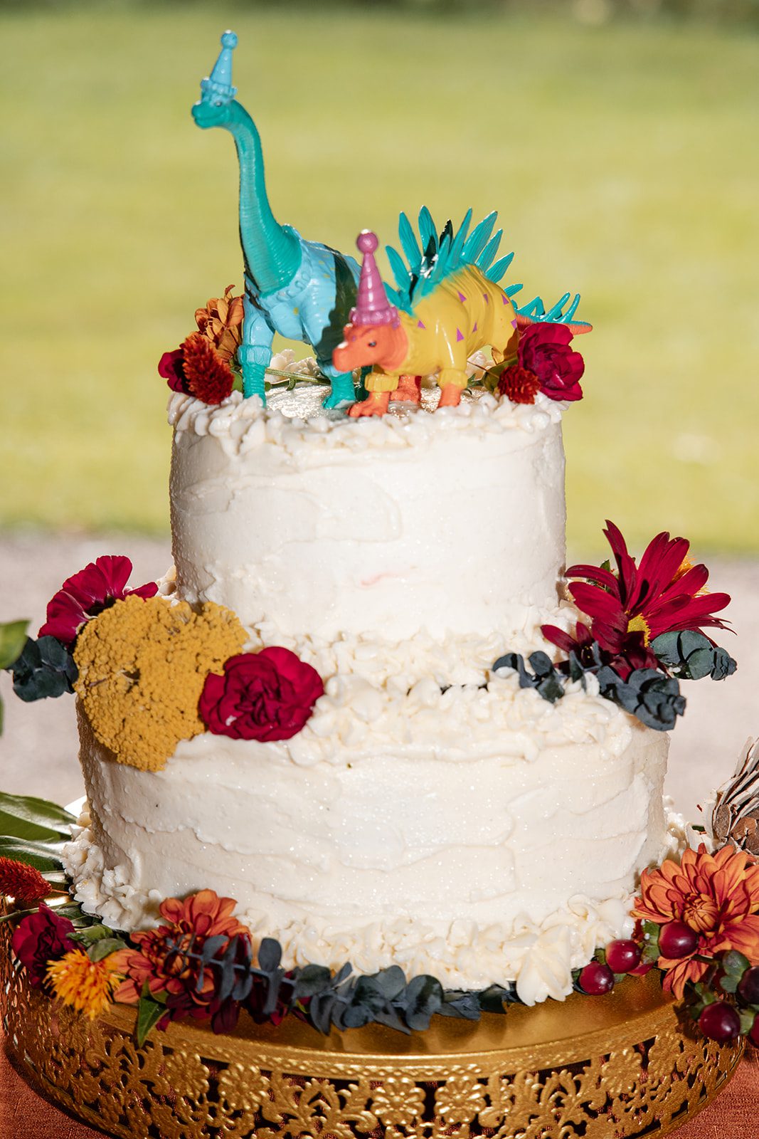 Wedding cake with jewel tone flowers