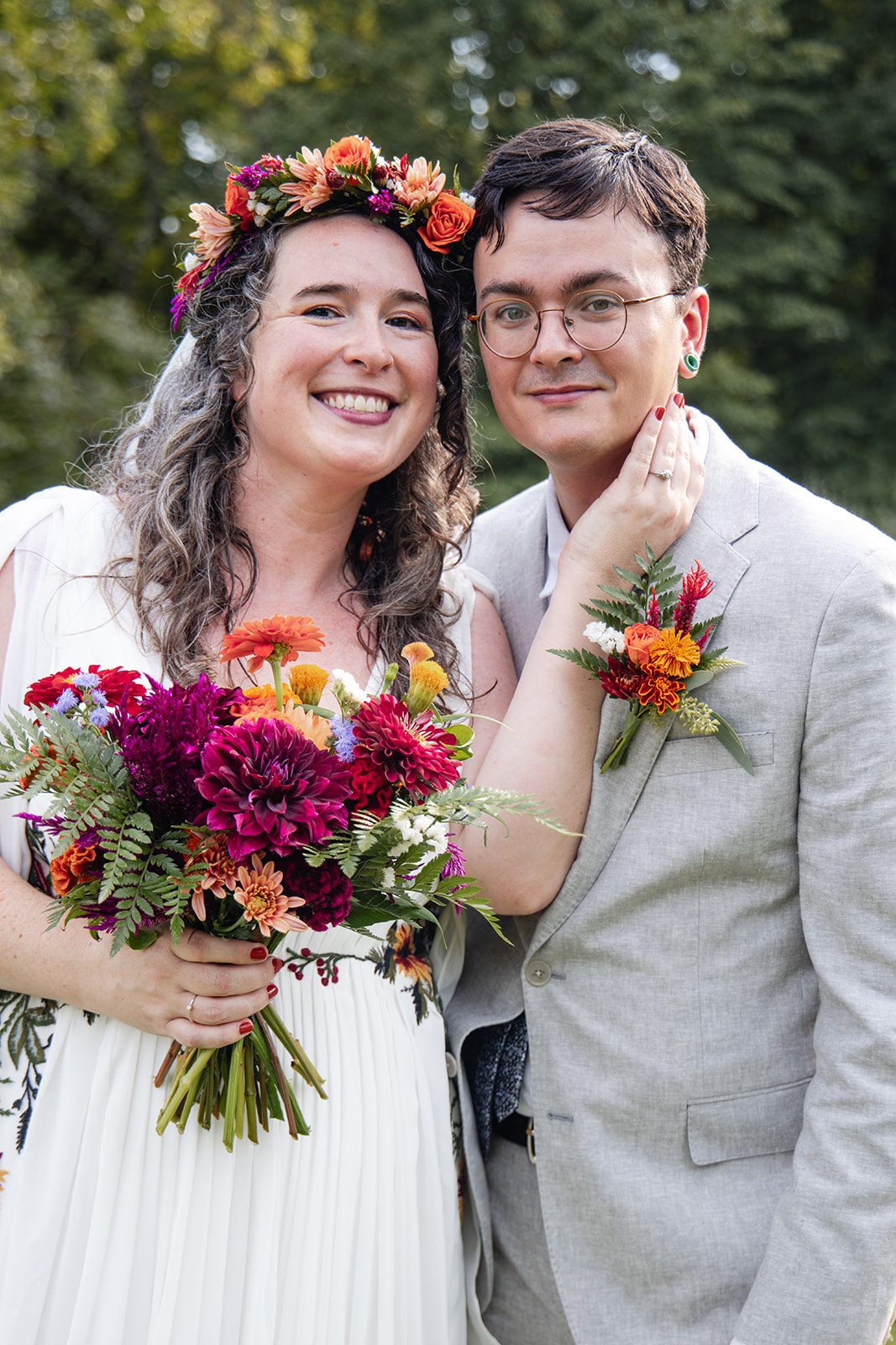 Bride and groom smiling together, captured by Cincinnati wedding photographers from Original Weddings at Pyramid Hill Sculpture Park