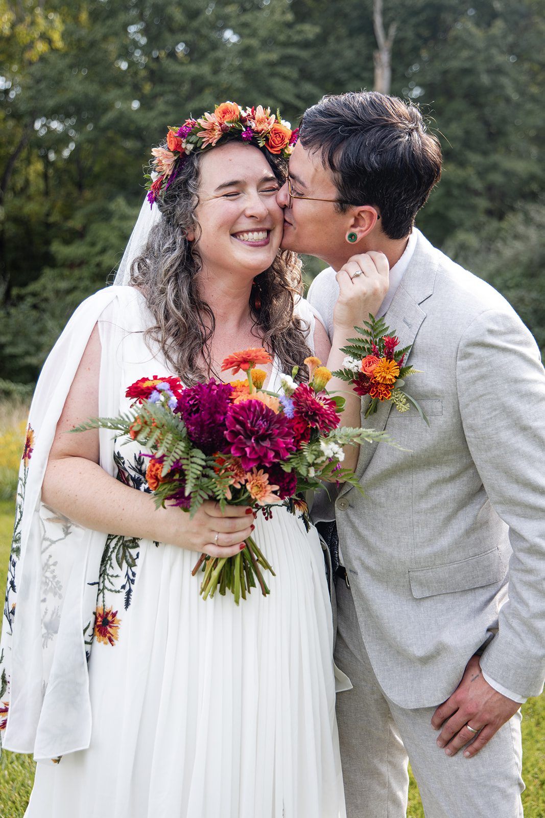 Couple with the bride's bouquet