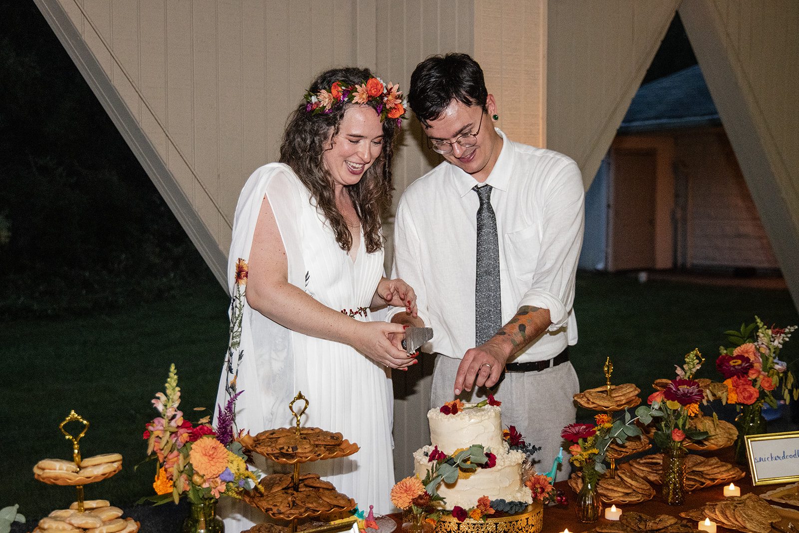Couple cutting their wedding cake