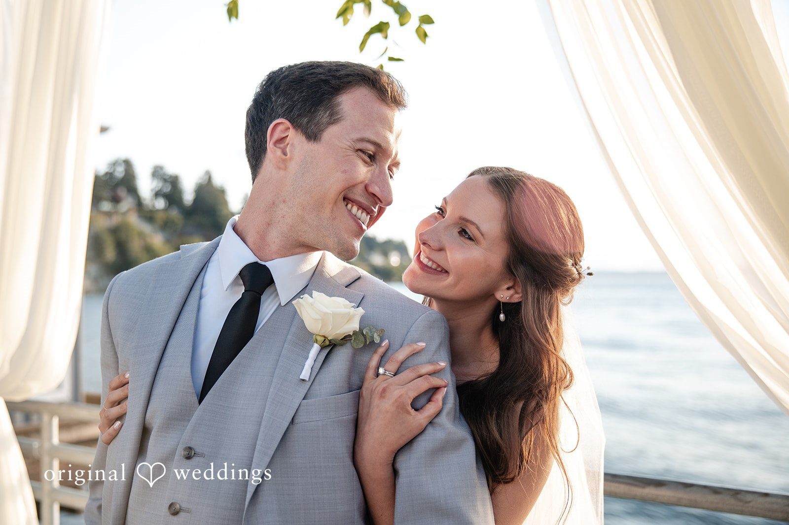 Jocelyn and Rylan’s wedding portrait at Ray’s Boathouse captured by Seattle wedding photographers.