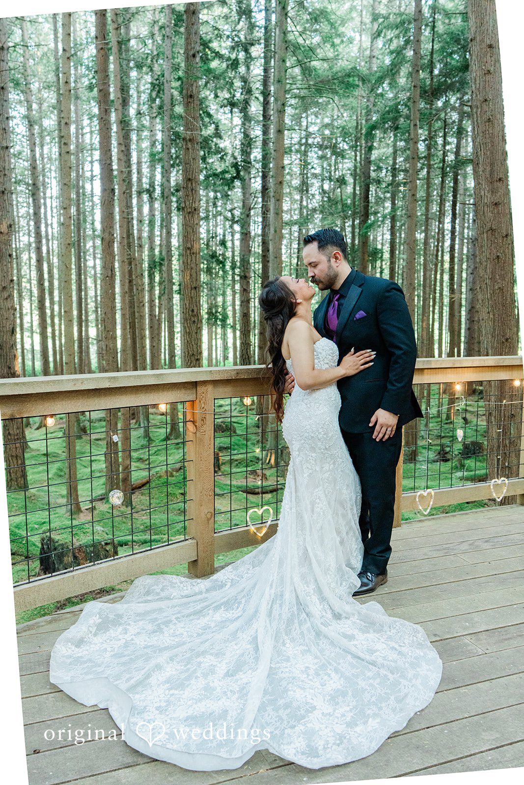 Christopher + Lydia Couple posing on a wooden deck
