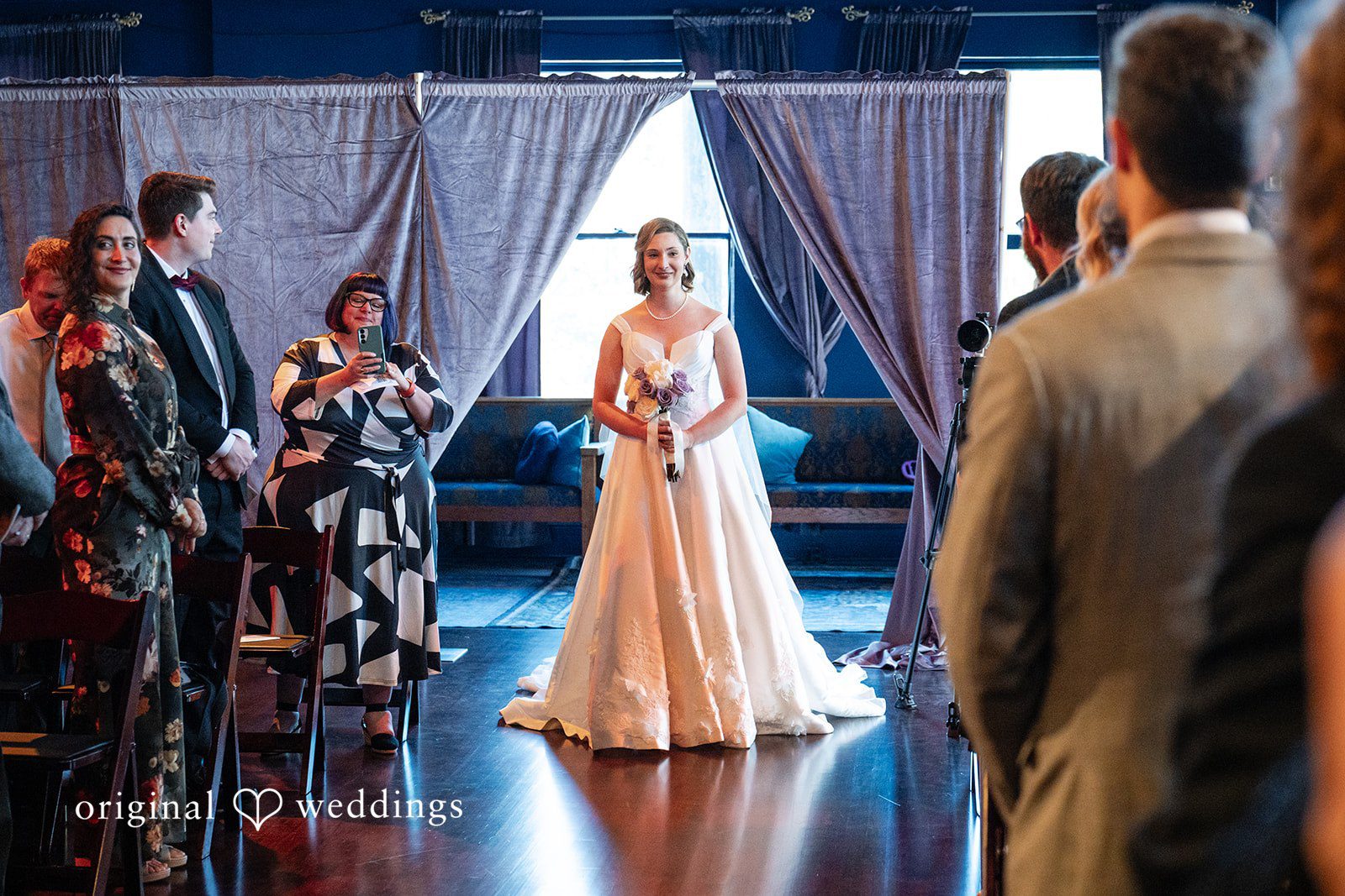 Bride walking down the aisle at Reverie Ballroom