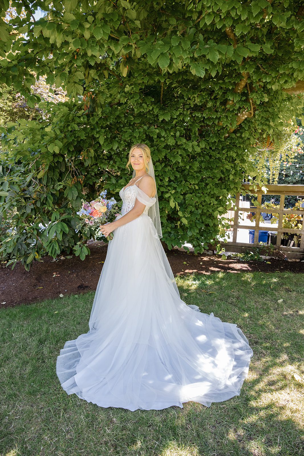 Bride smiling in the garden