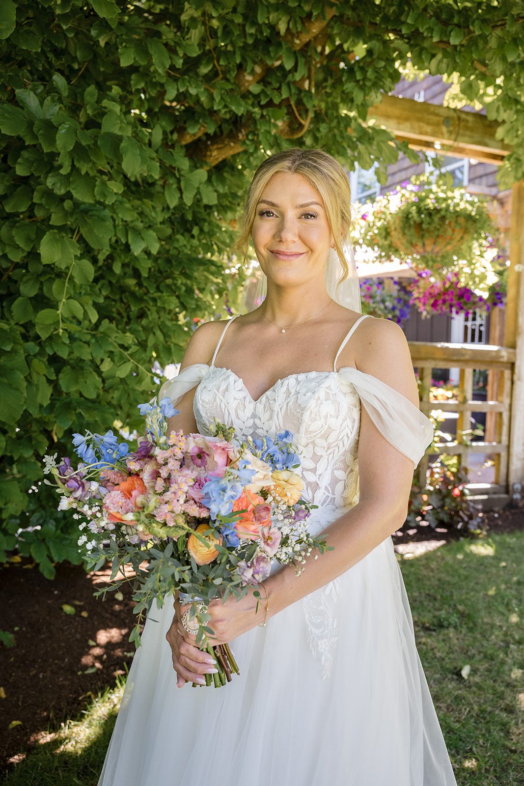 Bride holding her colorful bouquet