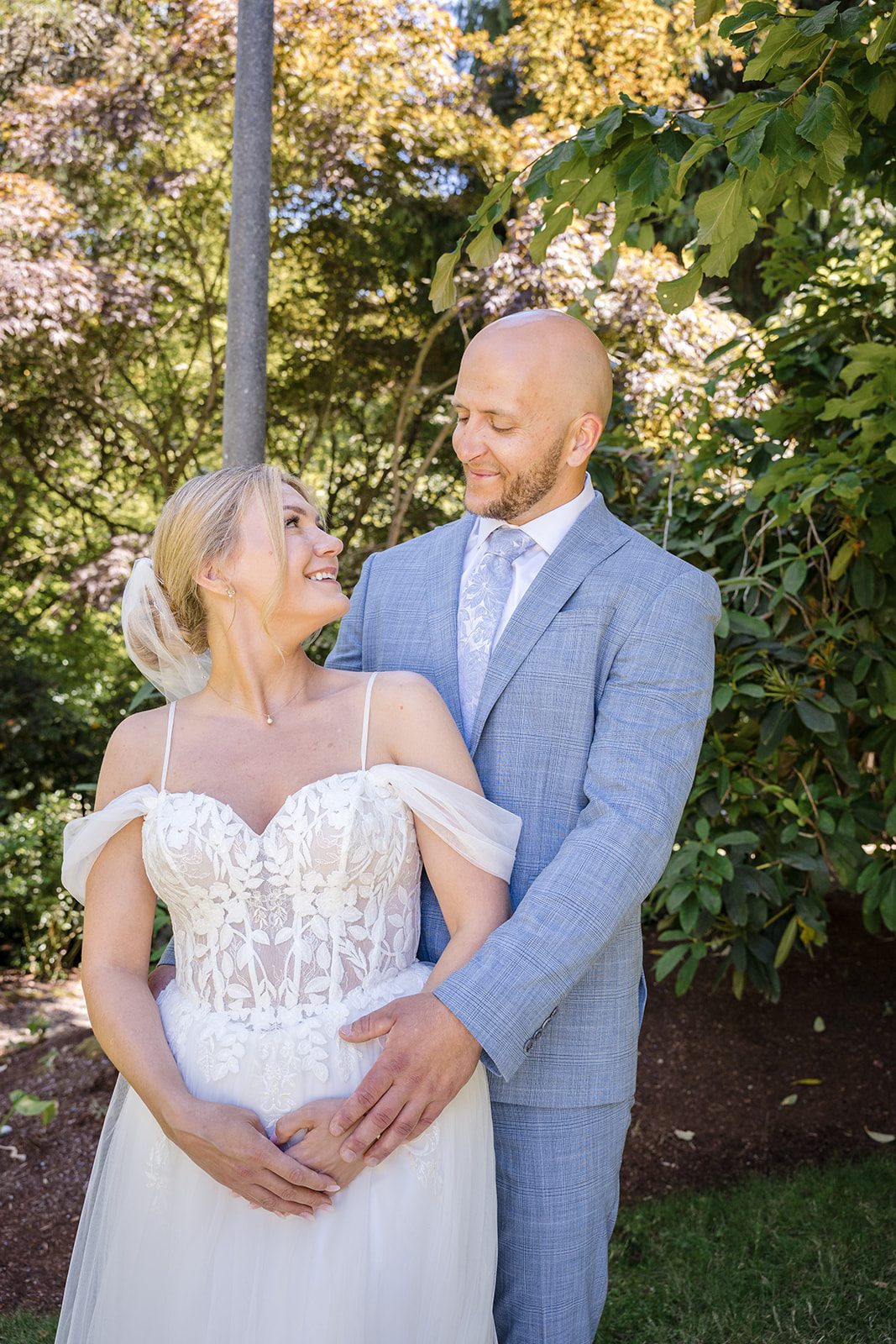 Couple sharing a first look in the garden