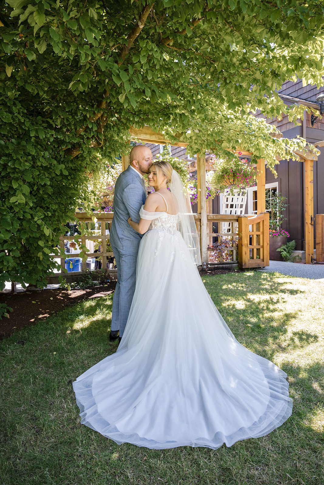 Bride and groom embracing after the first look