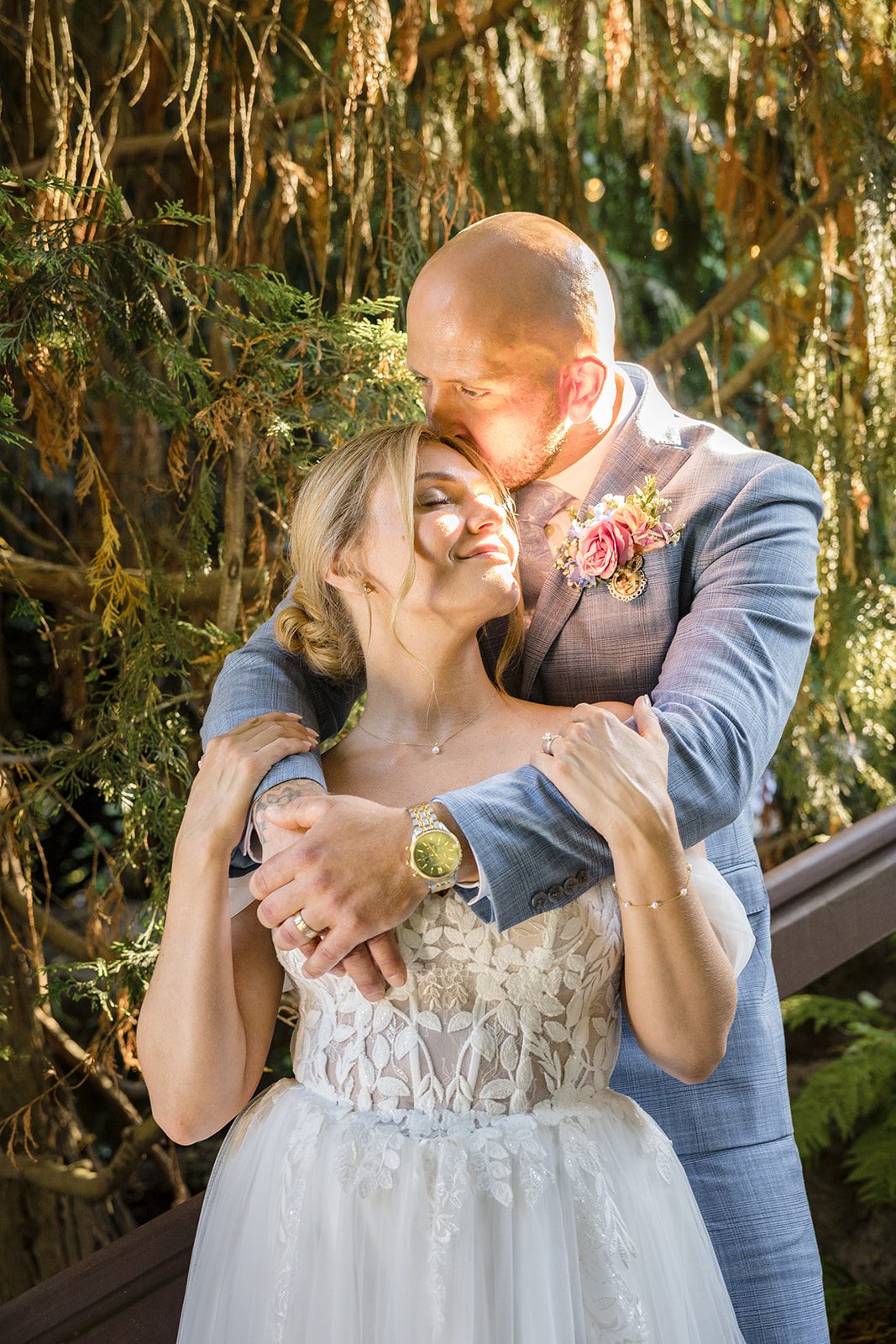 Bride and groom in a close embrace