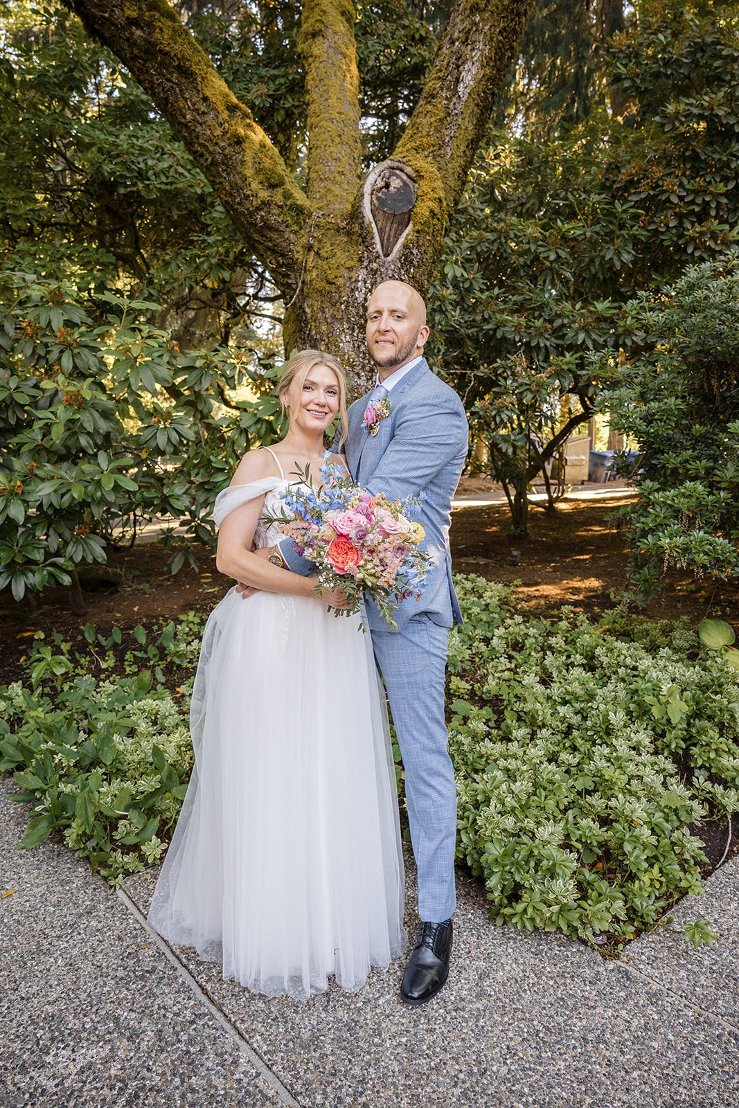 Couple laughing together in the garden