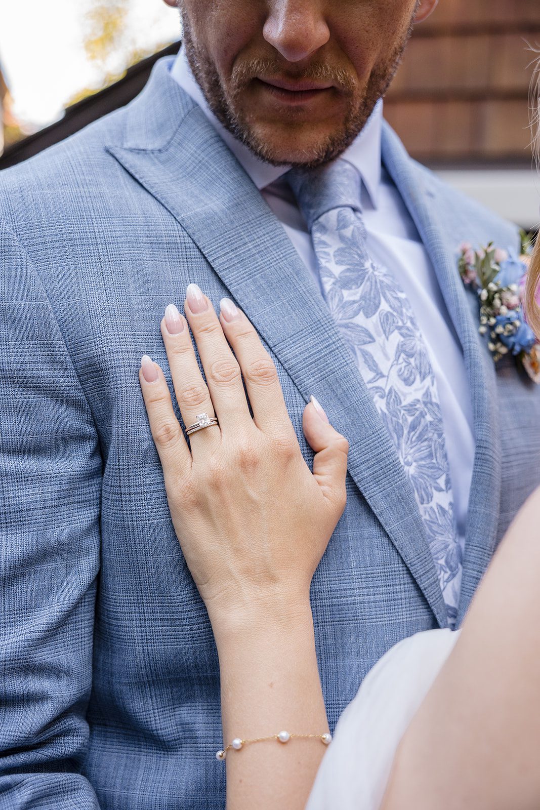 Close up of the couple's wedding rings