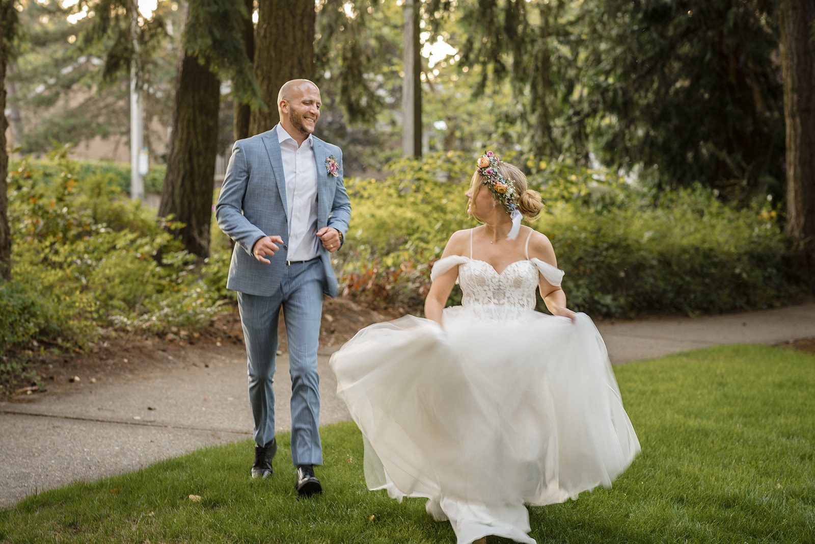 Bride's dress flowing as she spins