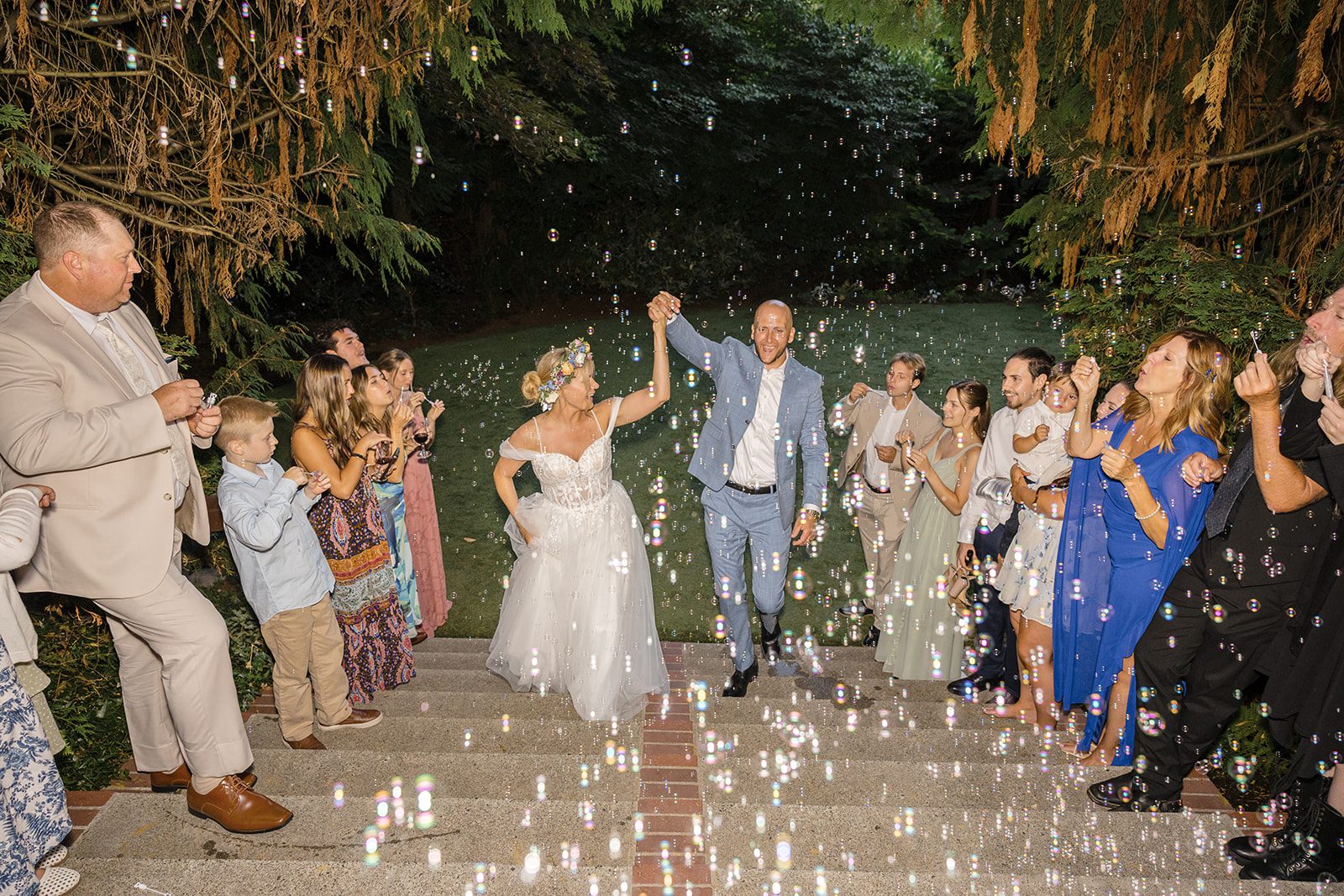 Newlyweds' joyful send off with petals