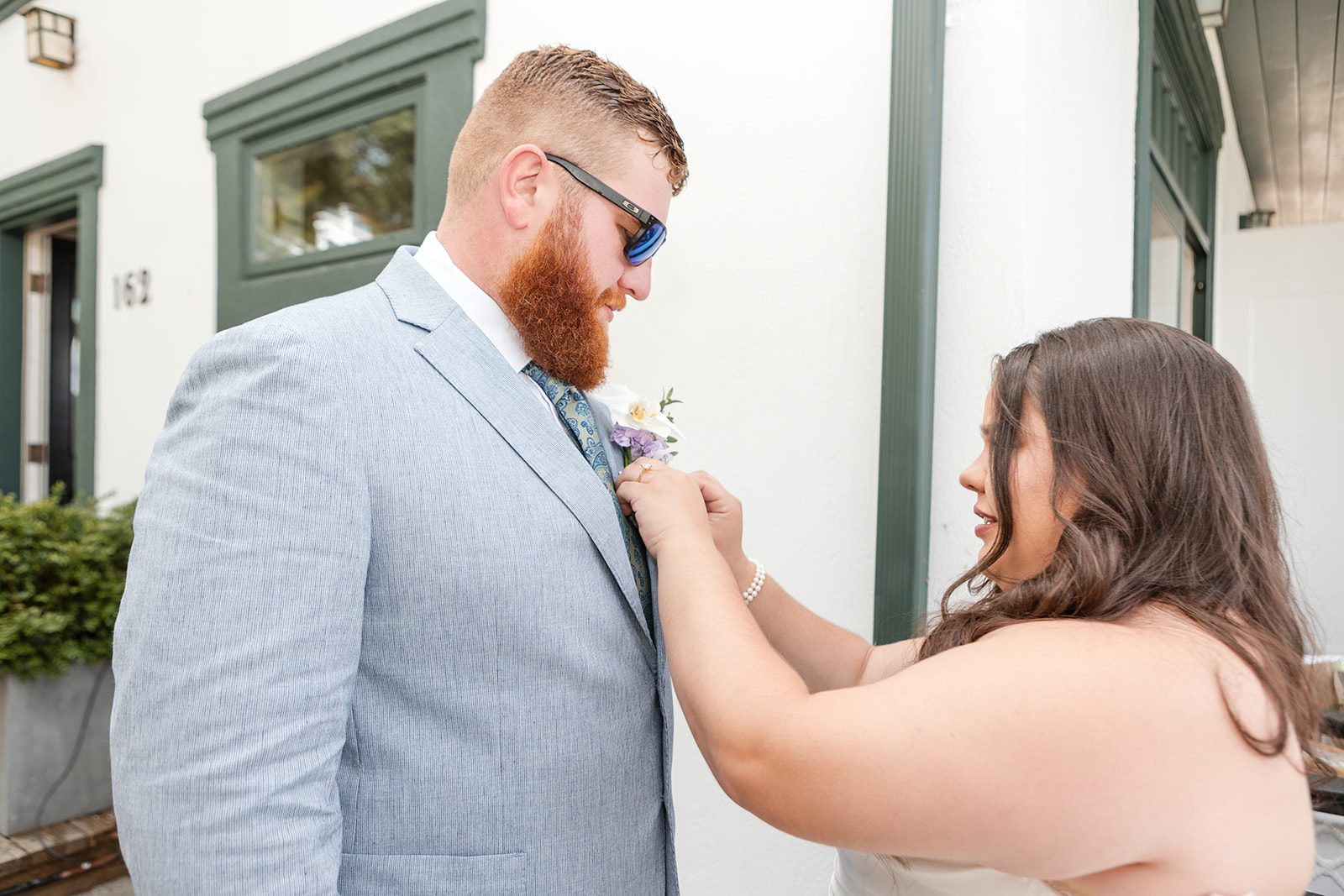roche-harbor-resort-timeless-seattle-emma-chase-emma-chase-013-32 Groom getting a final touch before the ceremony