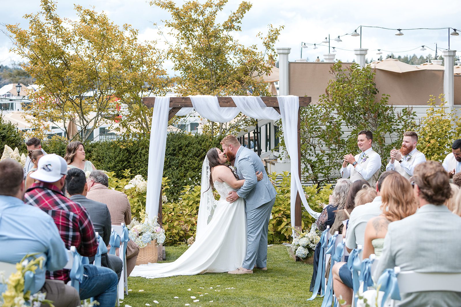 roche-harbor-resort-timeless-seattle-emma-chase-emma-chase-021-35 Couple holding hands during the ceremony