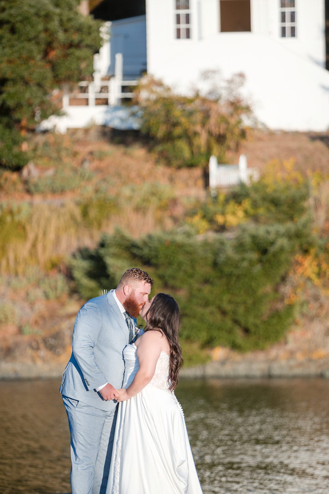 roche-harbor-resort-timeless-seattle-emma-chase-emma-chase-034-02 Bride and groom by the water at Roche Harbor Resort