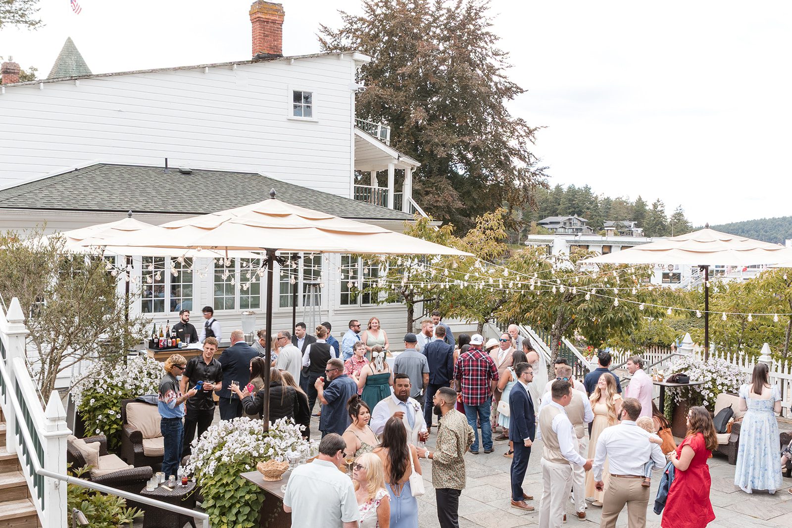 roche-harbor-resort-timeless-seattle-emma-chase-emma-chase-037-37 Guests gathered at the outdoor reception at Roche Harbor Resort