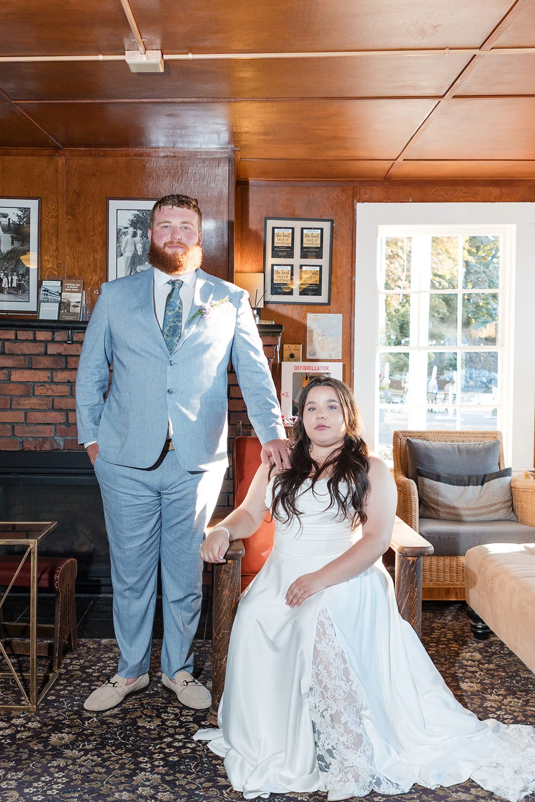 roche-harbor-resort-timeless-seattle-emma-chase-emma-chase-038-29 Bride and groom posing inside the reception room