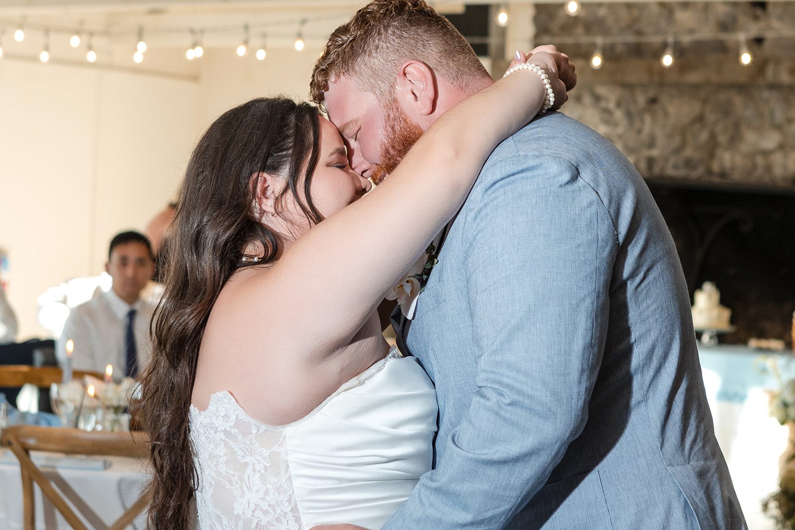 roche-harbor-resort-timeless-seattle-emma-chase-emma-chase-042-39 Couple kissing during their dance, captured by Seattle wedding photographers from Original Weddings at Roche Harbor Resort