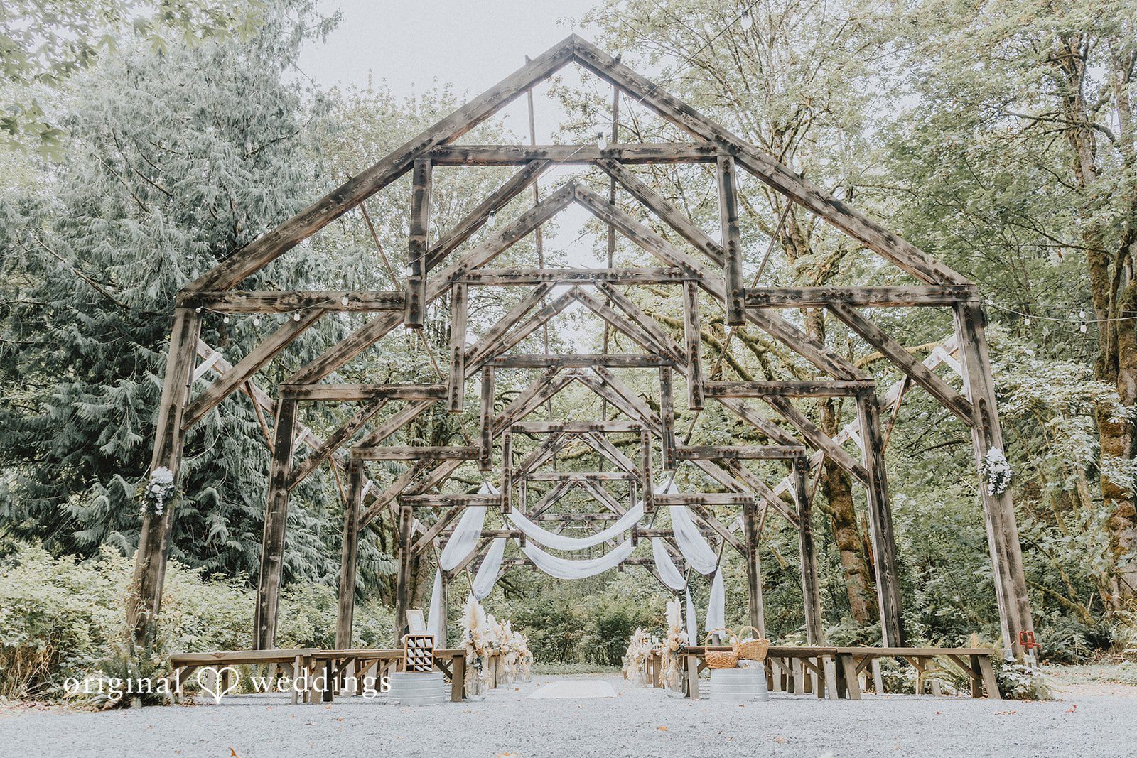 Kailyn + Tony Open wooden ceremony structure in the forest at Samara Farm
