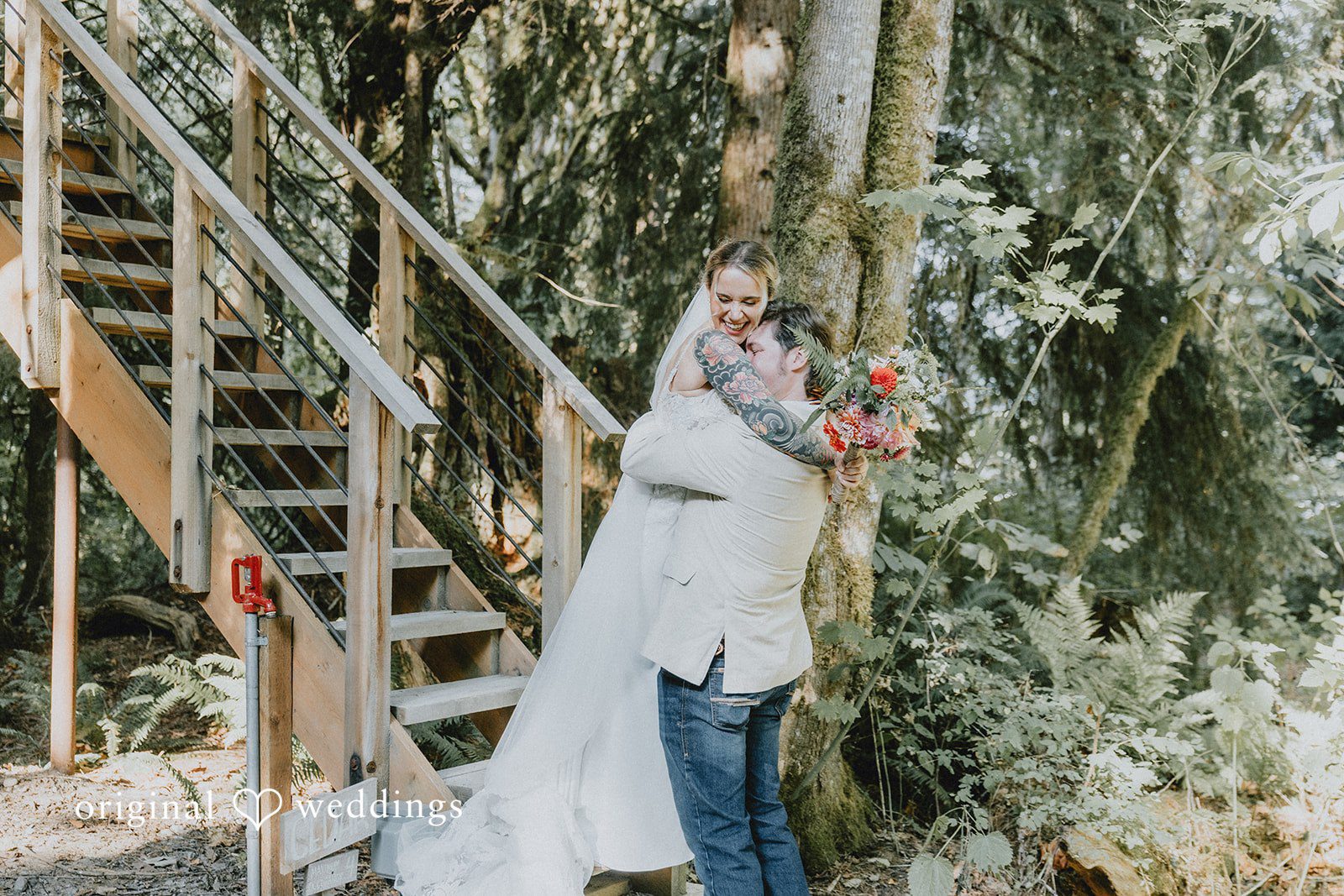Kailyn + Tony Couple hugging beside the treehouse at Samara Farm