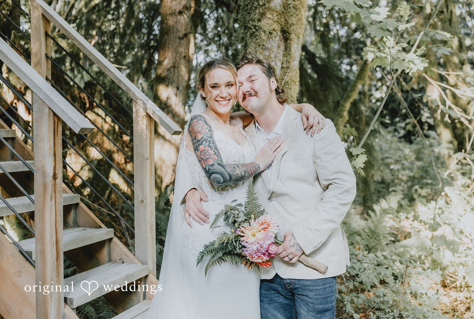 Couple smiling by the treehouse stairs, captured by Seattle wedding photographers from Original Weddings at Samara Farm