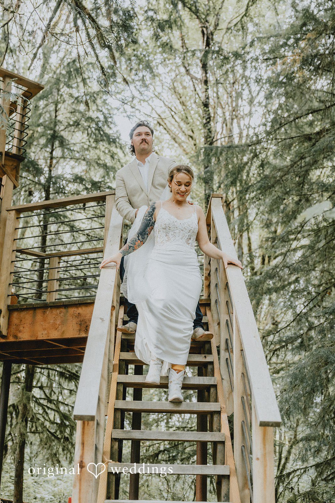 Kailyn + Tony Bride walking down the treehouse stairs