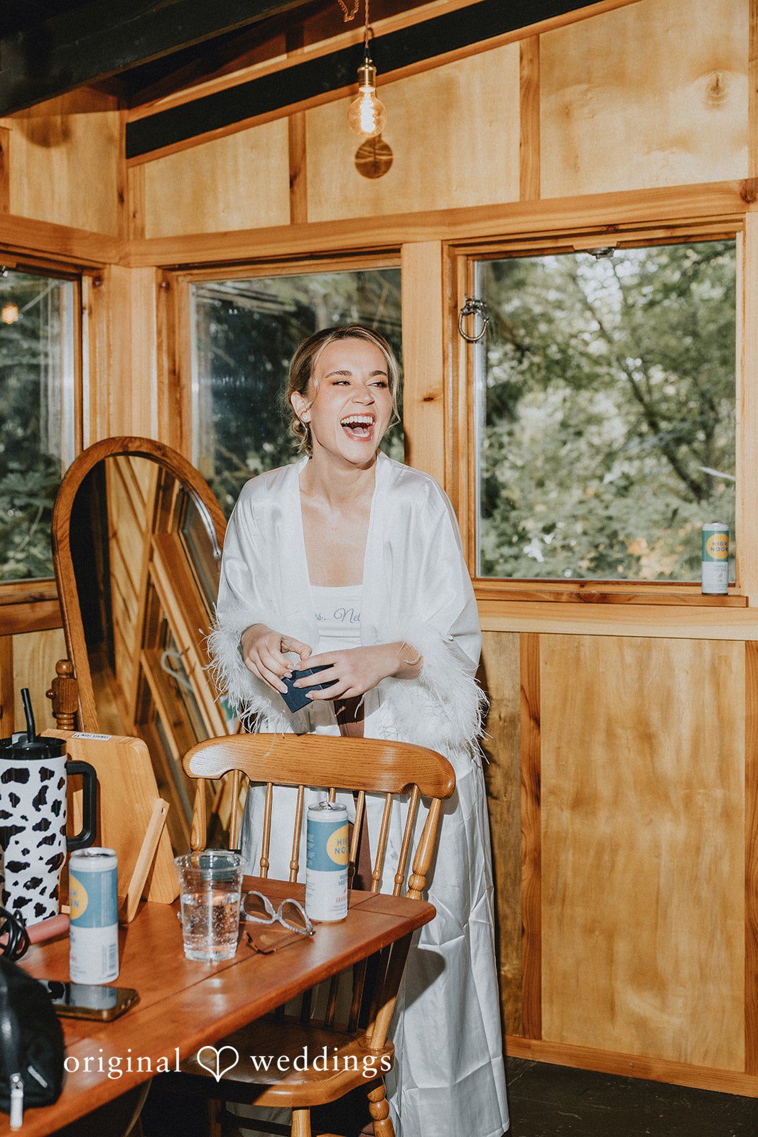 Kailyn + Tony Bride looking out the treehouse window