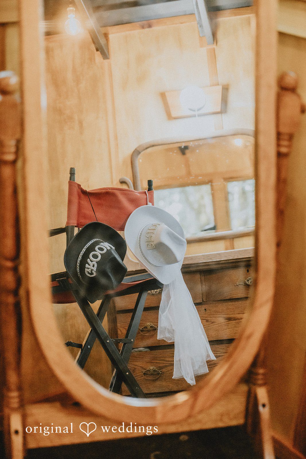 Kailyn + Tony Wedding dress reflected in a wooden mirror