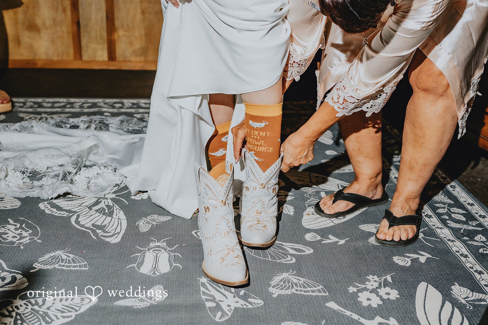 Kailyn + Tony Bride slipping on her boots