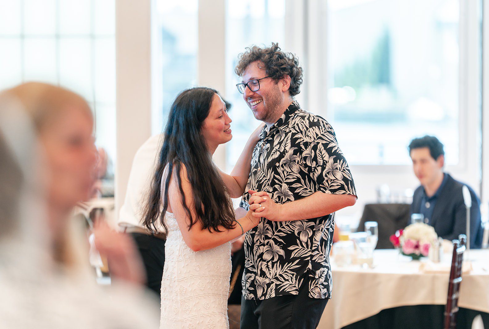 Bride and groom dancing at the reception, captured by San Francisco wedding photographers from Original Weddings at Scott's Seafood Grill & Bar