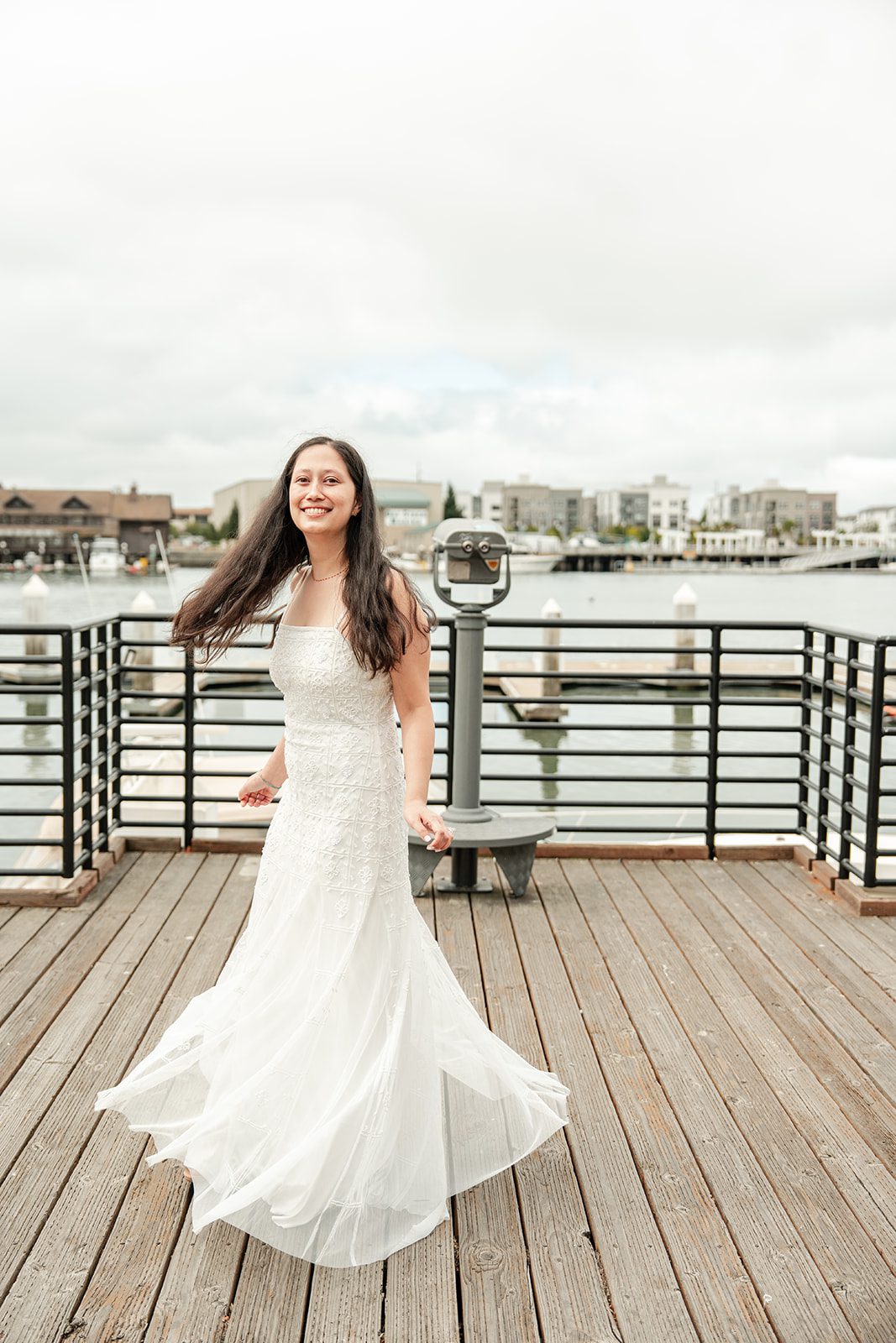 scotts-seafood-grill-bar-timeless-san-francisco-libby-ethan-p004-01 Bride twirling in her gown on the deck at Scott's Seafood Grill & Bar