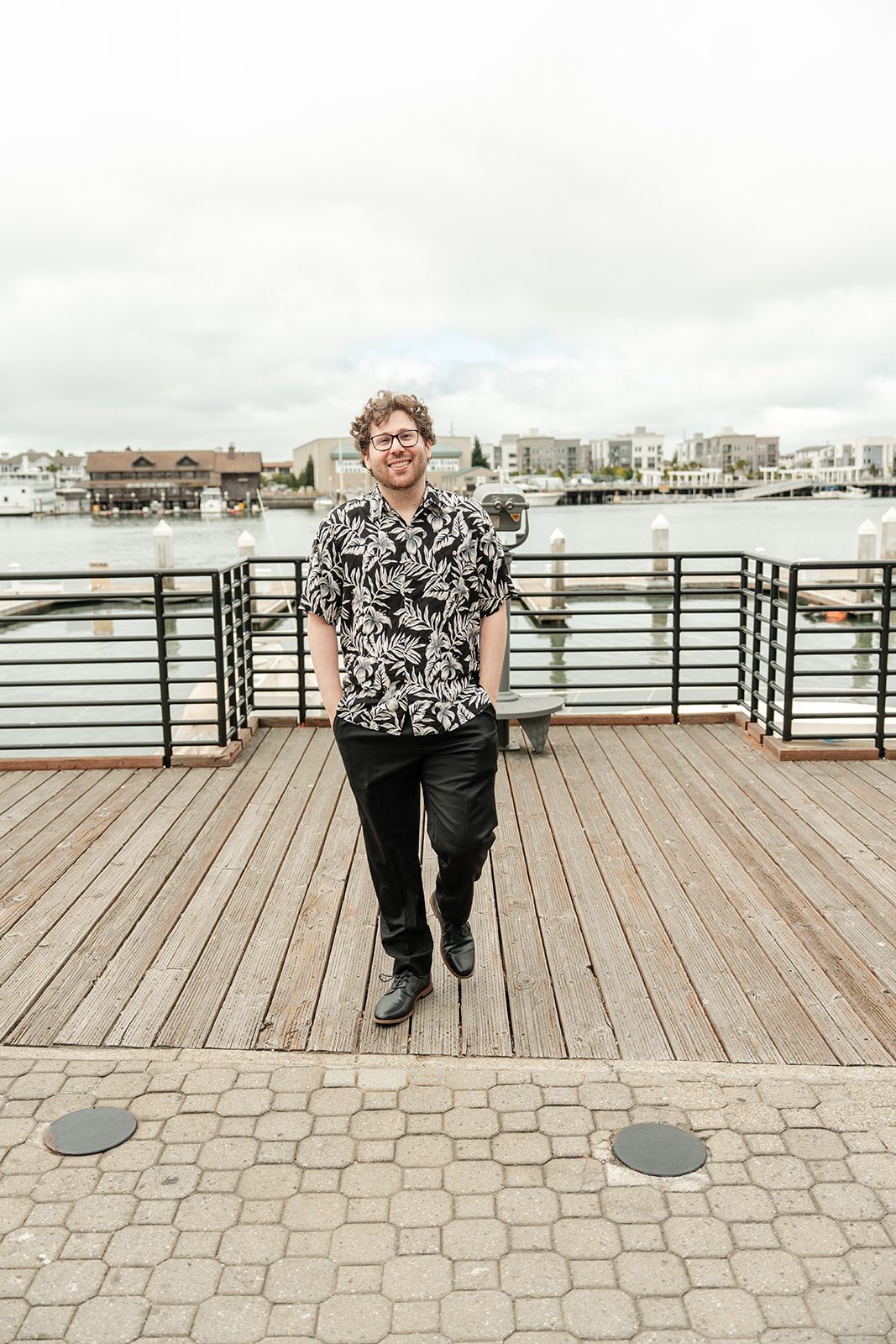 scotts-seafood-grill-bar-timeless-san-francisco-libby-ethan-p005-06 Groom in a Hawaiian shirt on the pier