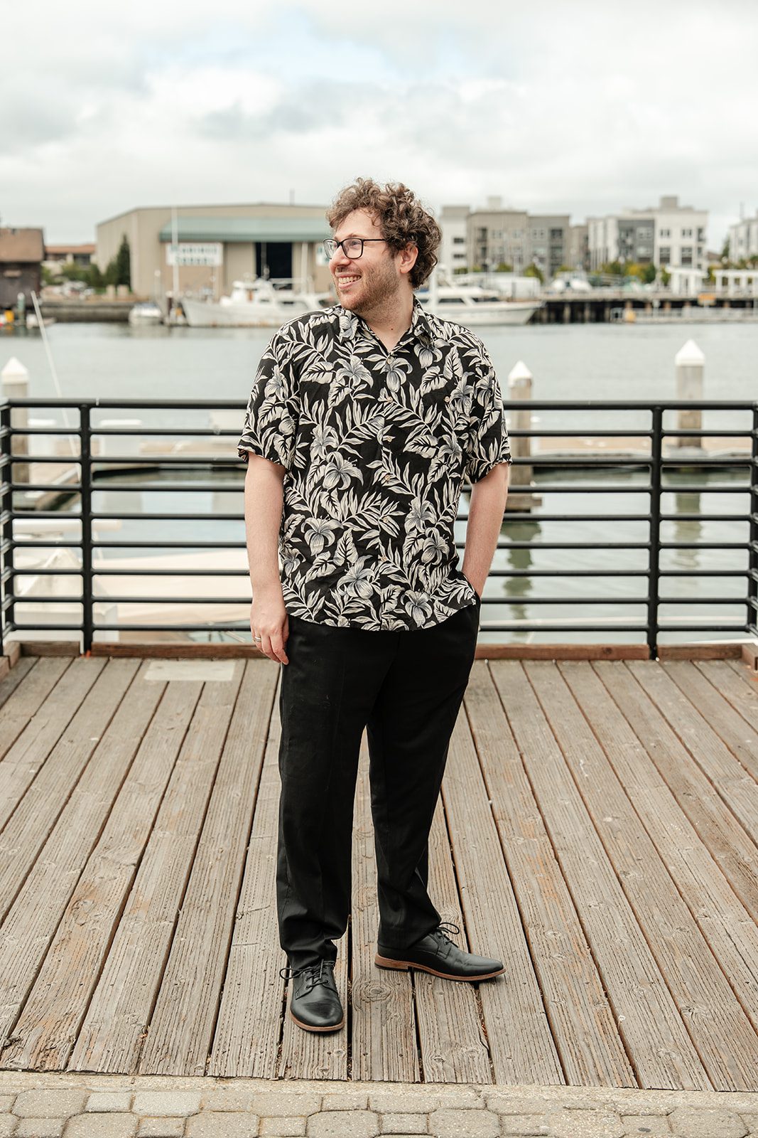 scotts-seafood-grill-bar-timeless-san-francisco-libby-ethan-p006-10 Groom smiling by the marina at Scott's Seafood Grill & Bar