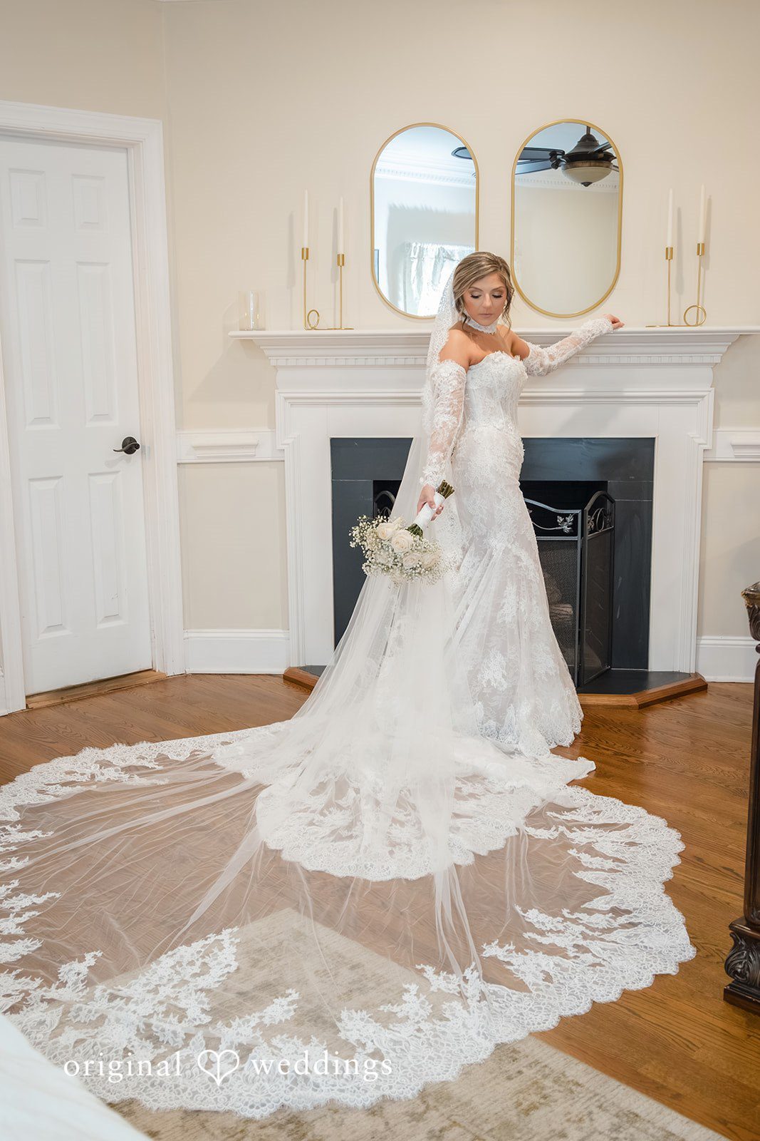 Holly + Adam Bride's long train in the bridal suite at Seven Paths Manor