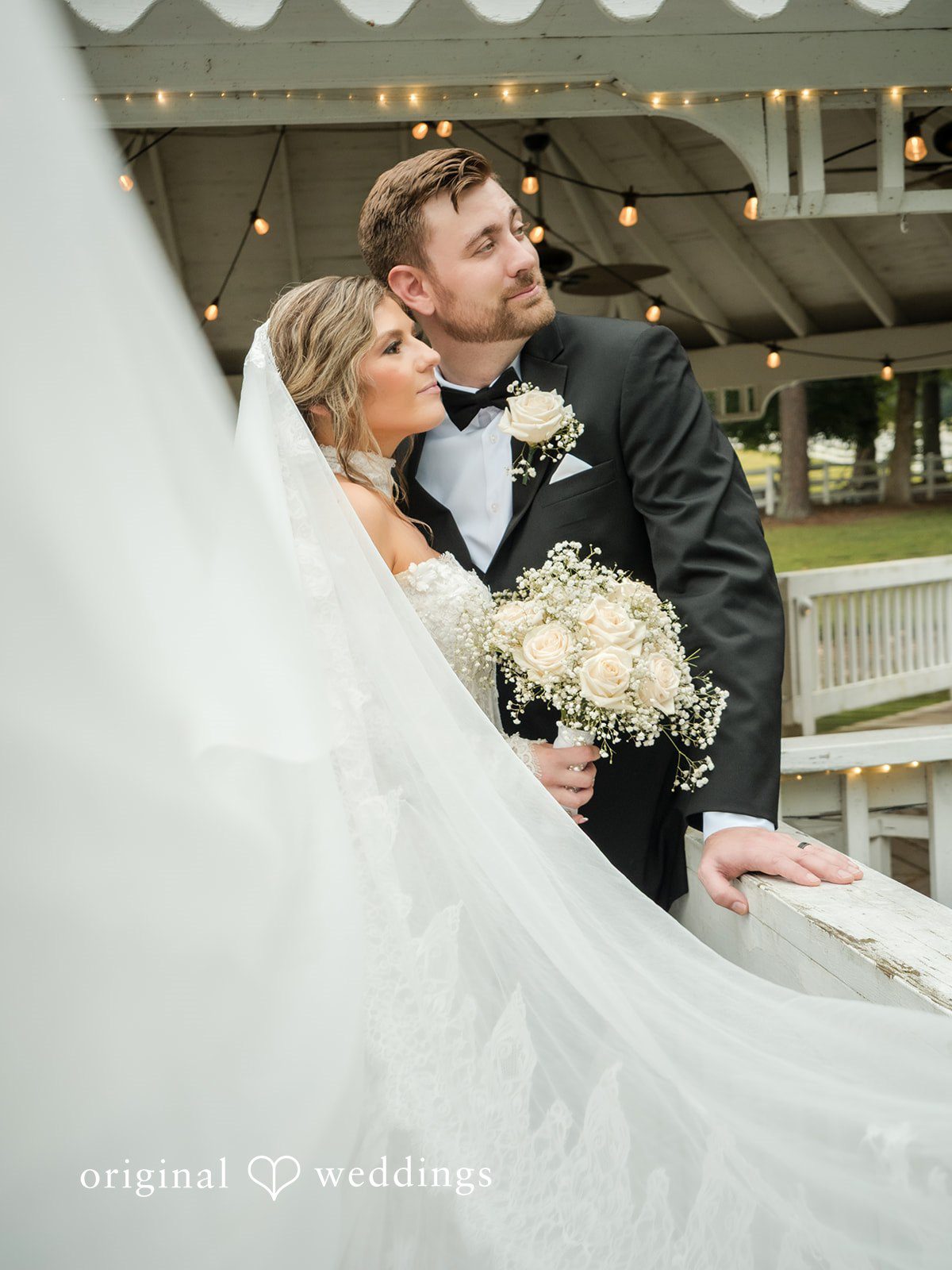 Holly + Adam Couple close with the veil at Seven Paths Manor