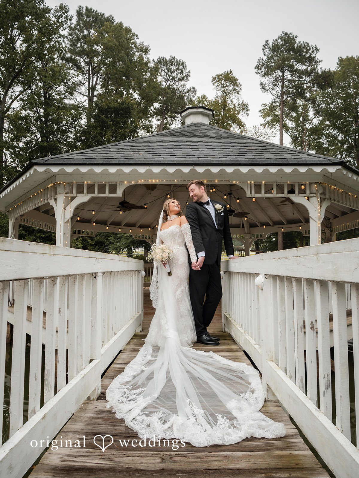 Holly + Adam Couple on the gazebo bridge