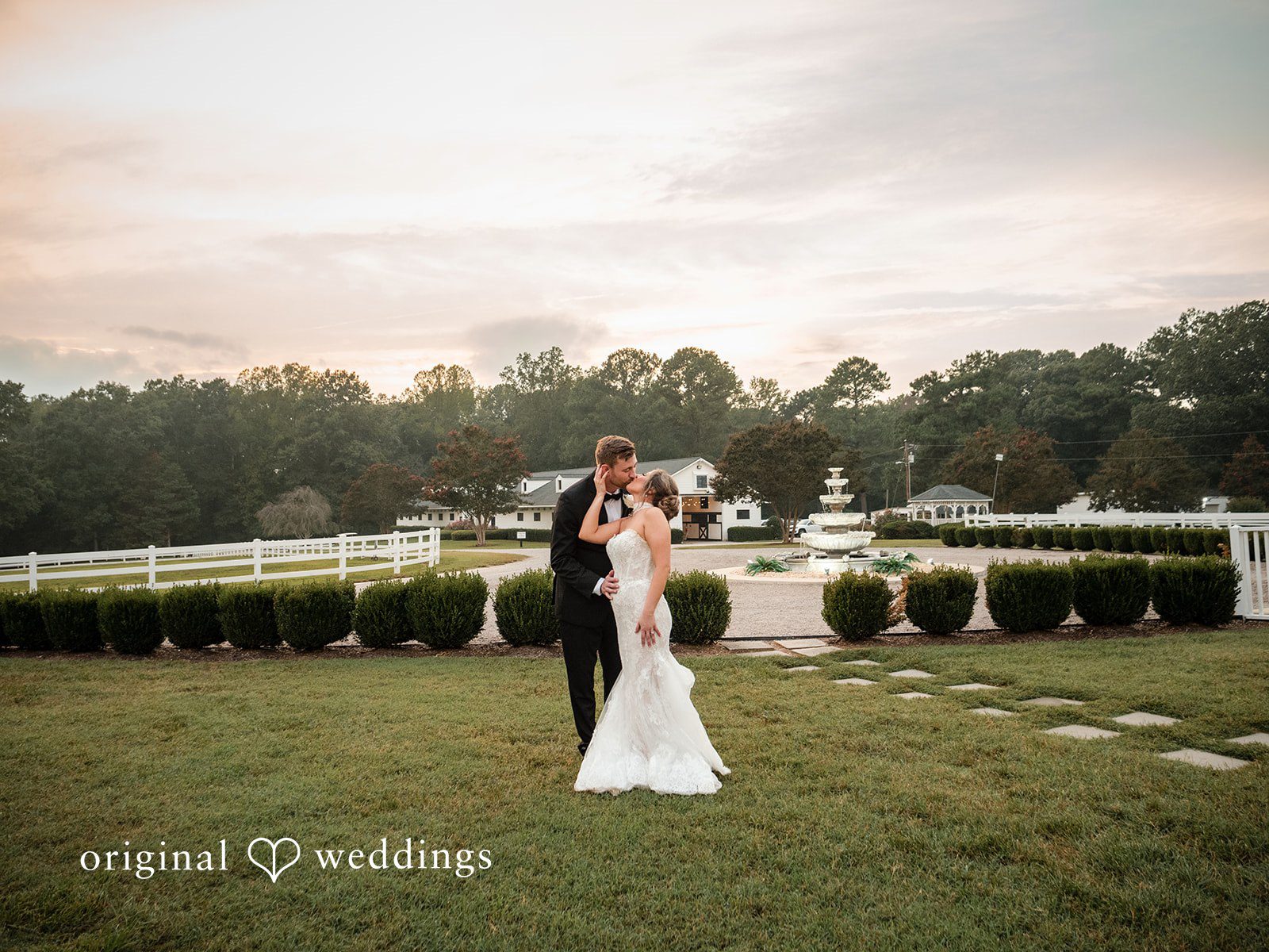 Holly + Adam Couple at sunset on the lawn