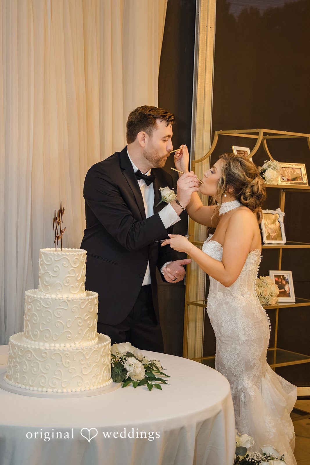 Holly + Adam Couple sharing cake