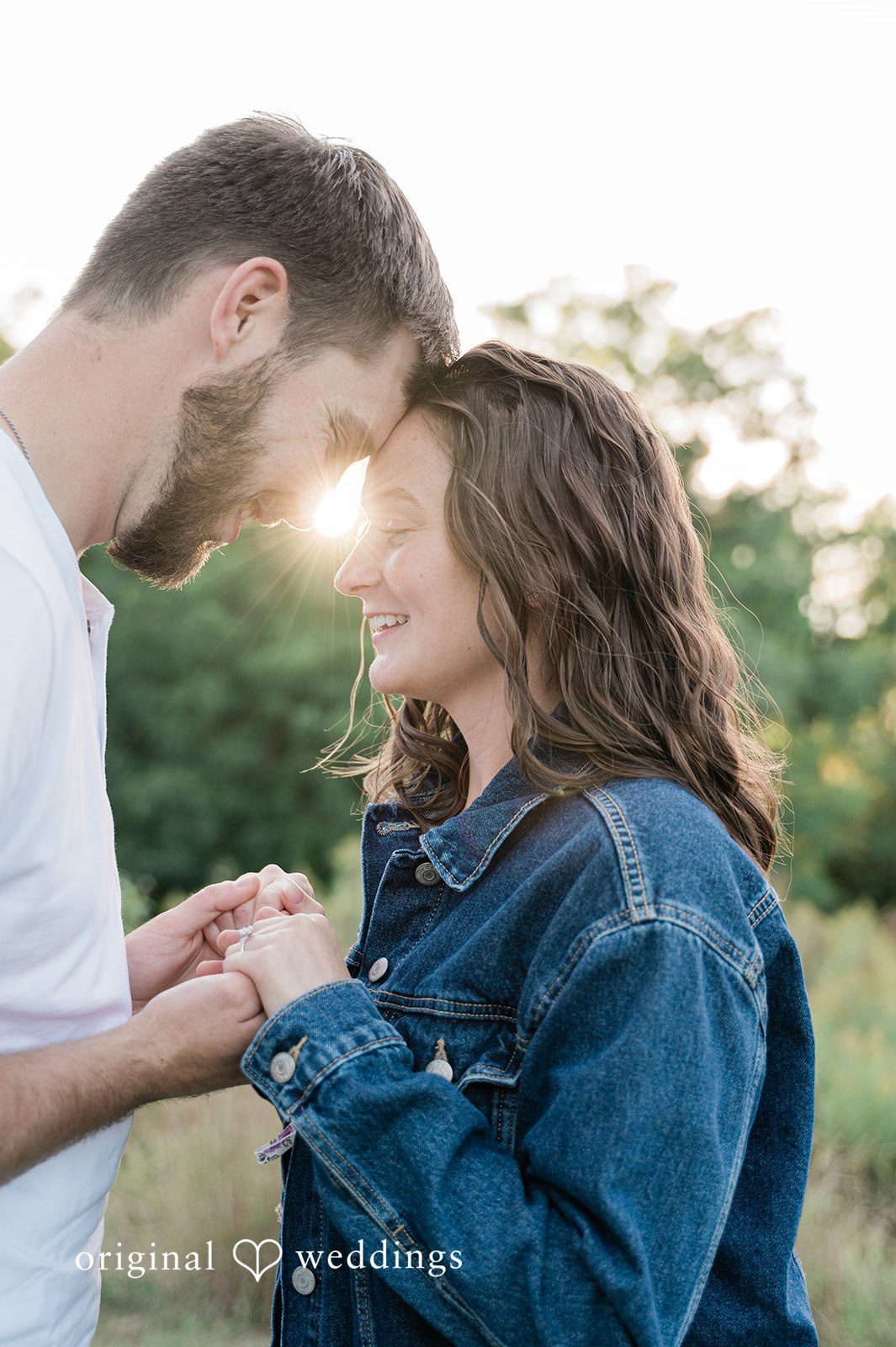Jada + Nathan Couple touching foreheads at sunset at Silverwood Park