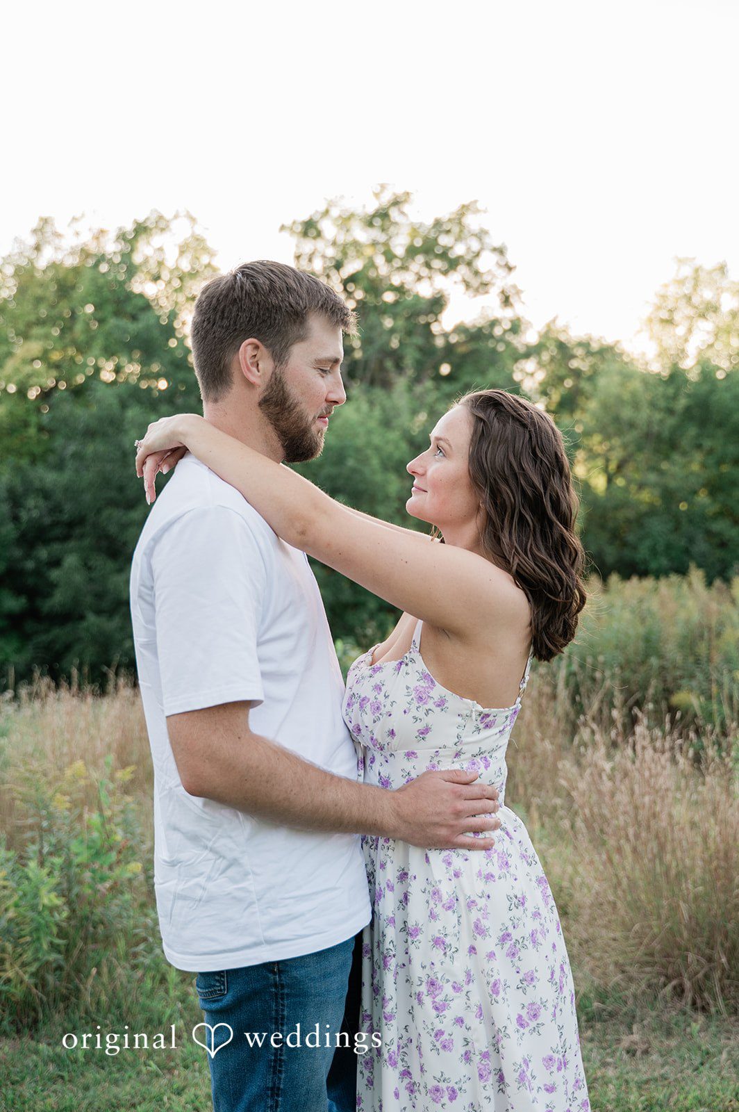 Jada + Nathan Couple embracing in the prairie at Silverwood Park