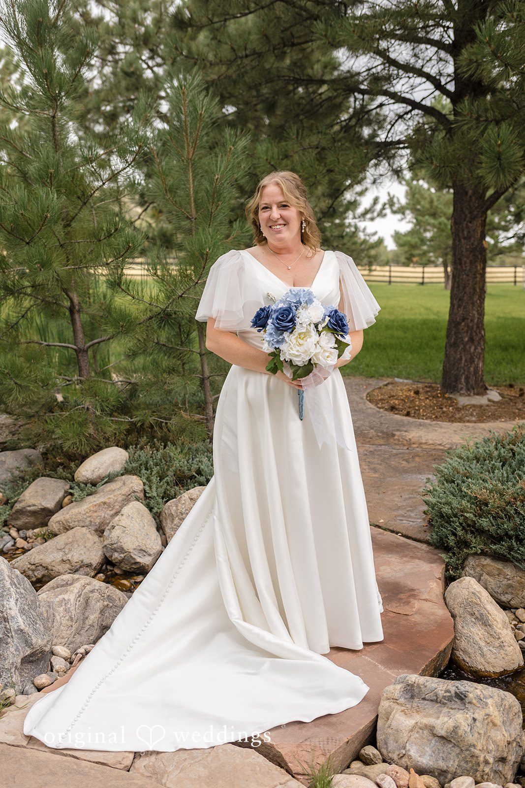 Faith + Brandon Bride portrait among the pines