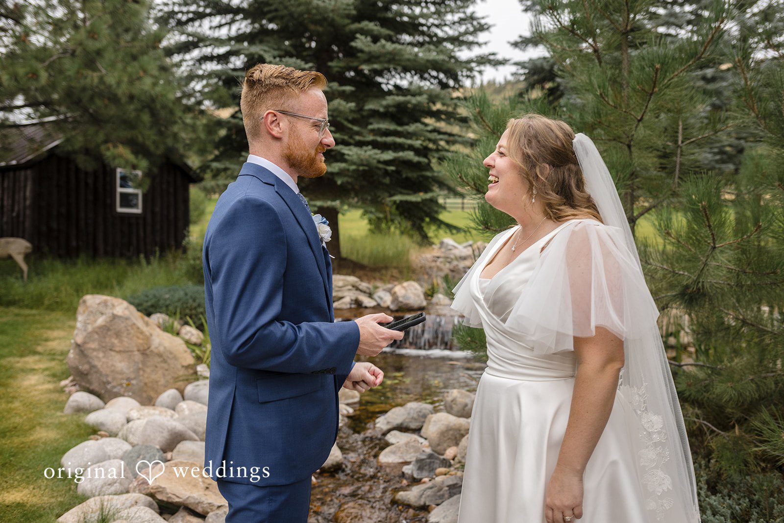 Faith + Brandon Couple sharing a first look by the creek