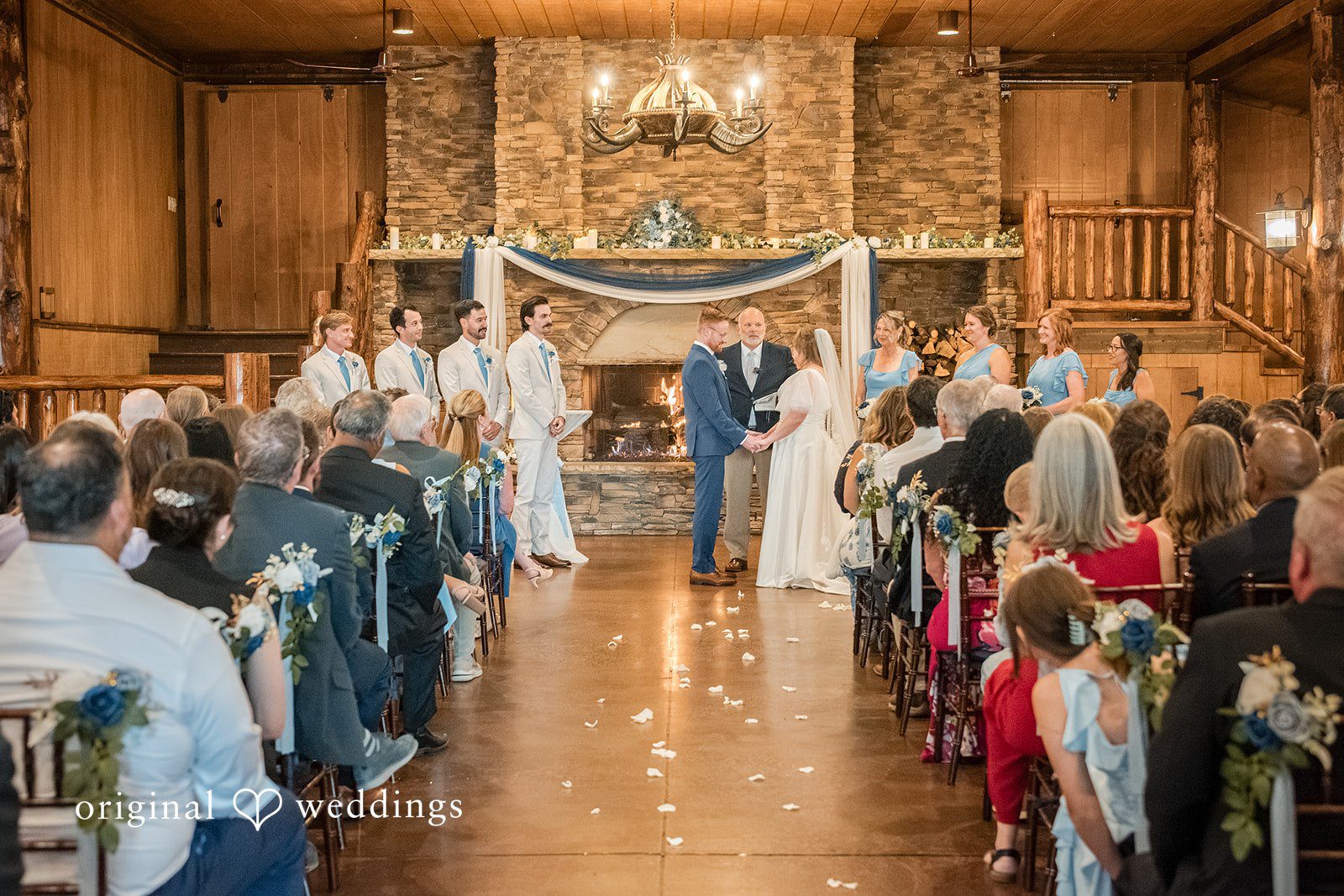 Faith + Brandon Guests seated for the ceremony in the lodge at Spruce Mountain Ranch