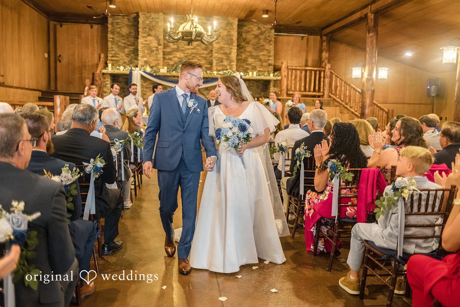 Faith + Brandon Couple walking back up the aisle as newlyweds