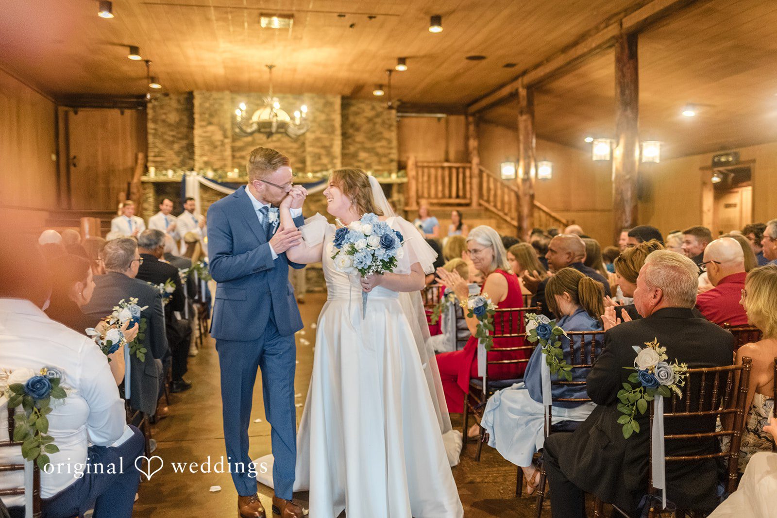 Faith + Brandon Couple at the altar with family watching